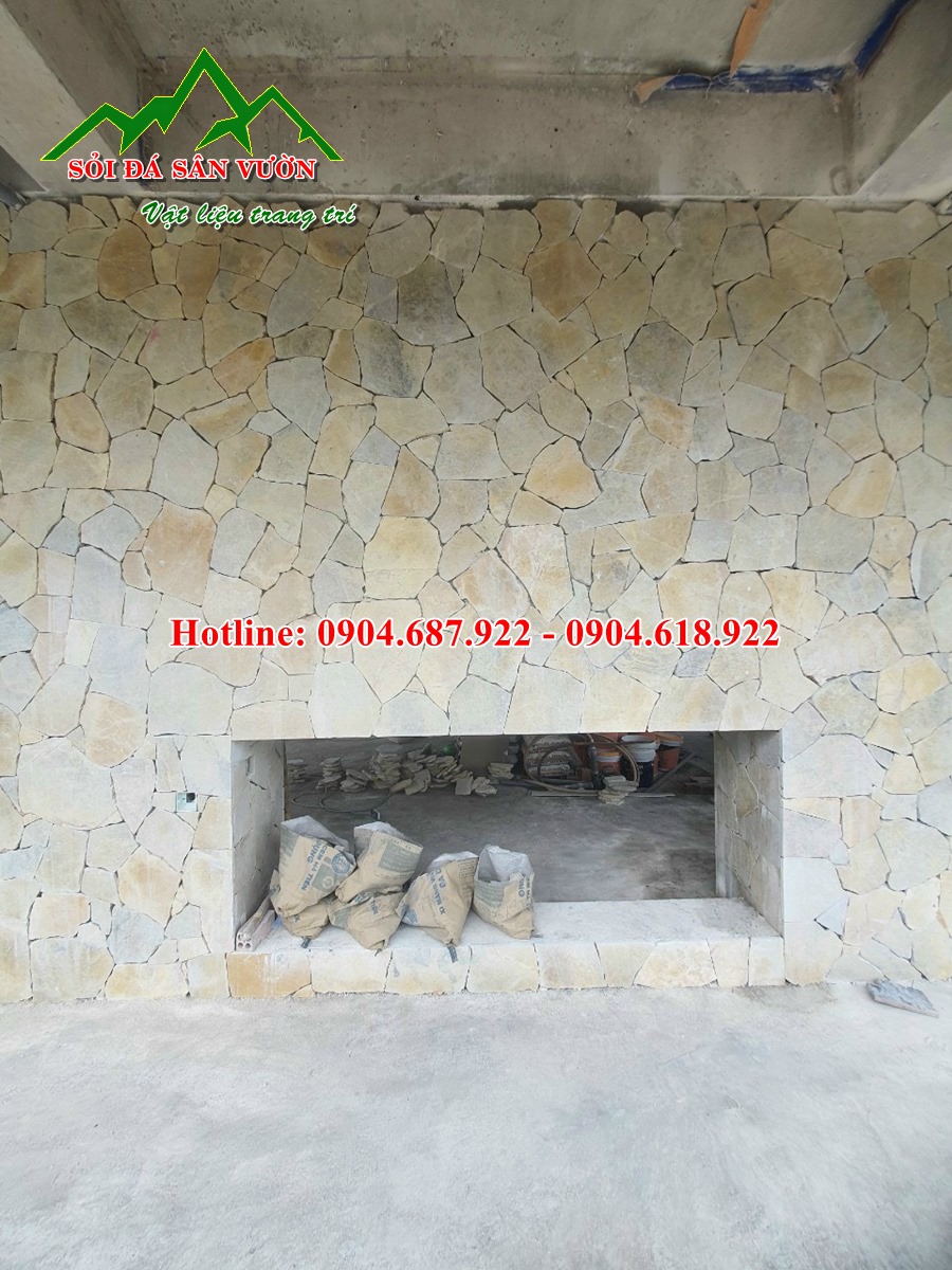 Tường ốp đá rối vàng mài giả cổ